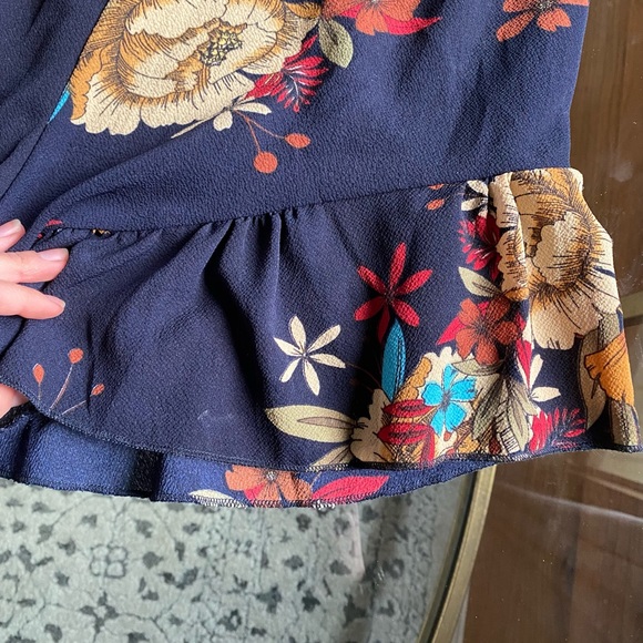 Floral Summer Romper with Ruffle bottom and Criss cross back - Picture 4 of 8